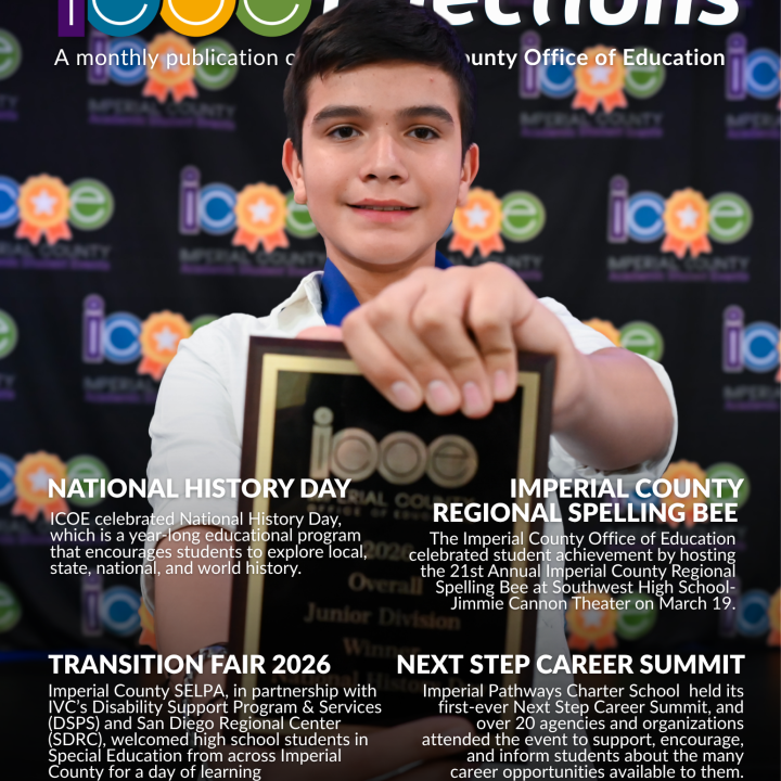 Student holding a plaque
