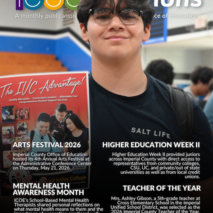 Boy holding a college magazine